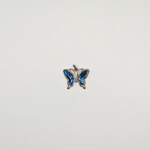 Tiny silver and blue butterfly pendant